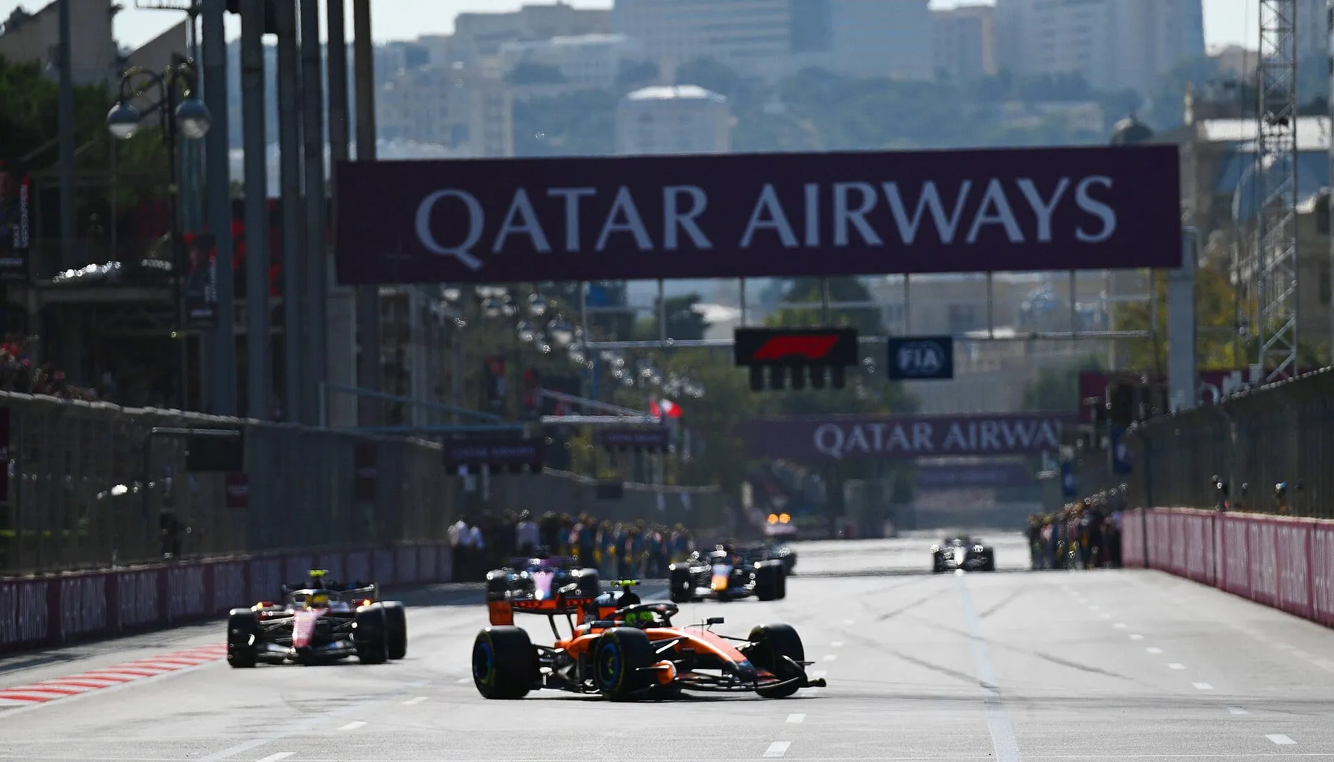 Cars accelerate away from the start line at the 2026 Azerbaijan Grand Prix