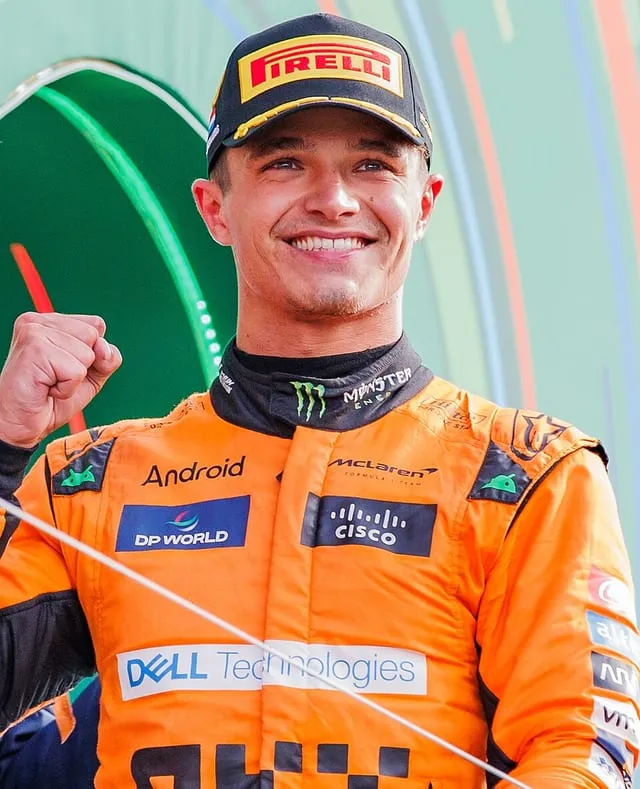 Lando Norris in McLaren kit on the podium at the 2024 Dutch Grand Prix